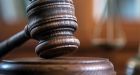 Judge rejects refugee claimaint's testimony his child pornography belonged to Abu Dhabi police