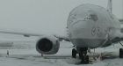 Heavy snow shuts Paris airport, creates chaos in Scotland