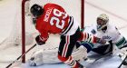 Bolland, Chicago fend off Canucks in a big way
