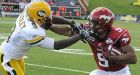 Eskimos withstand Stampeders to stay unbeaten