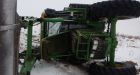 The most Canadian police chase ever: Alberta Mounties bum ride on snowmobile to chase stolen John Deere tractor | National Post